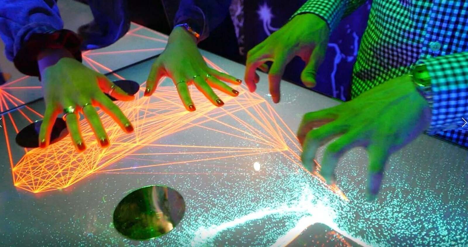 An immersive technology table at a brand activation for Bixbee